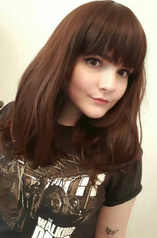 Chocolate is a natural mix of auburn and brown to create this beautiful warm colour from roots to tips. Sleek long layers are styled in a blow out for volume. Its long thick full fringe can be cut to suit the wearer.