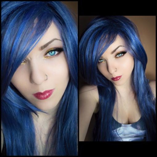 Very long, straight wig in a deep blue with subtle dark low-lights. It has a long fringe that can be parted in the middle, or swept to one side.