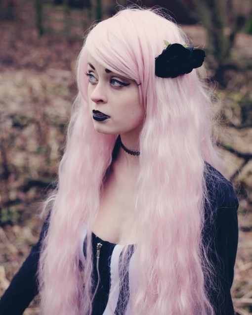Candyfloss is a big, fluffy crimped style with a long thick fringe. We love the pastel pink shade from the roots to tips. The lengths fall to the hips, lots of hair to style and dress.