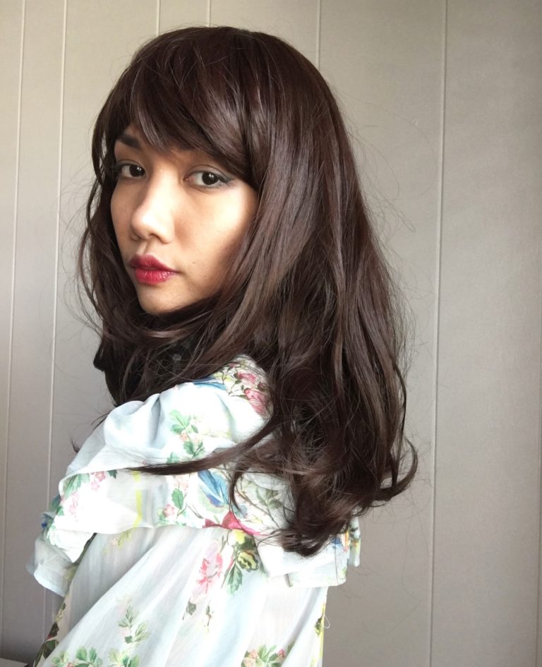 Chocolate is a natural mix of auburn and brown to create this beautiful warm russet colour from roots to tips. Sleek long layers are styled in a blow out for volume. Its long thick full fringe can be cut to suit the wearer.