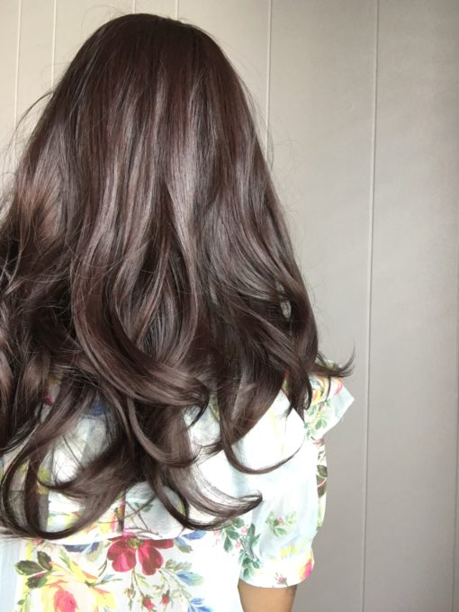 Chocolate is a natural mix of auburn and brown to create this beautiful warm colour from roots to tips. Sleek long layers are styled in a blow out for volume. Its long thick full fringe can be cut to suit the wearer.