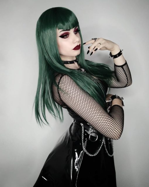 Green long straight wig with fringe. Forest defines deep green hair! Subtle layers give this sleek look some movement.