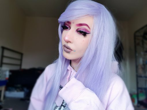 This soft, pastel style is a purple dream! Lilac Sky is a very long, sleek wig with a very long fringe which is designed to either be pushed to one side or cut to the desired length.