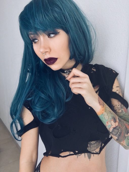 Looking for a Hine cut, then look no further. Precious Metal is a distinctive aquamarine blue and green mix of colours. Its full fringe adds to the layers around the face, sleek from the roots and styled in the classic blow-out.