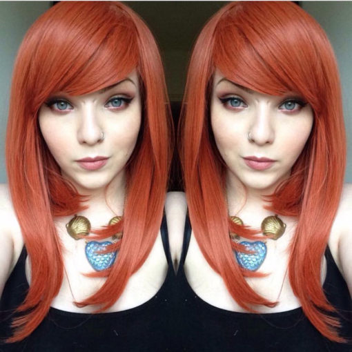 Orange long straight wig with fringe. A firm favourite of the spicy tones we have. Pumpkinhead is a muted sleek ginger that doesn't fade with time.