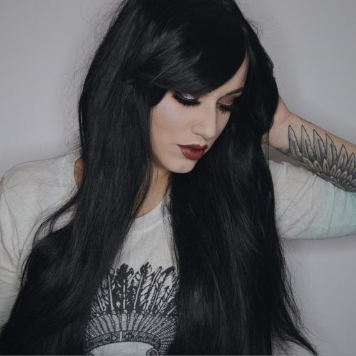 The Dark is the ultimate in Goth glamour. Jet black, with a long fringe that can be worn either parted or swept to the side. It is poker straight and at 80cm it reaches waist-length. The ultimate dramatic statement for your hair!