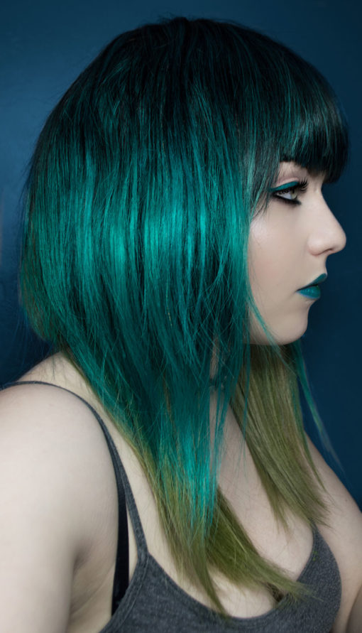 A cool mix of greens and choppy layers makes this a highly unusual and surprisingly natural feeling wig.
