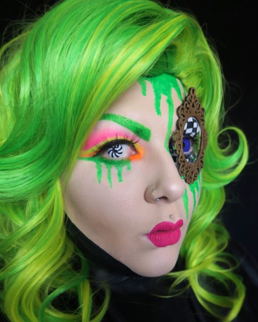 Toxic Pop is a bright mix of bold yellow and lime green, set in shoulder length curls. Not one for those looking to blend in, we love the neon look!