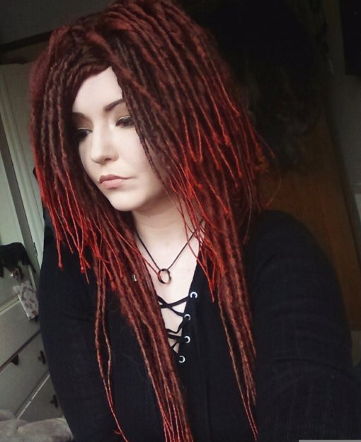 Warrior Princess - Lush Wigs UK Our first dreadlock wig! Warrior Princess is a mixture of brown and bright red hair, styled into thin dreadlocks that fall in layers around the face, shoulders and chest. The wig has more volume of hair on the top, and works great styled in a half up/half down look.