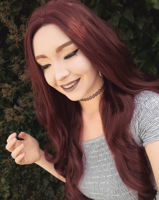 Burgundy red long curly lace front wig. Spiced Apple is a staple style that holds it own. Deep burgundy shades and an abundance of loose curls.