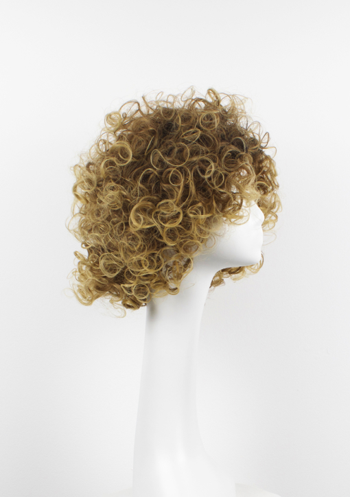 Blonde short curly wig. Calling all dancing queens! Stargaze is a vibrant and fresh style. Dark brown roots with ash blonde locks. This tight spiral curl wig is perfect for those who want to try a mop of curls without hours of styling!