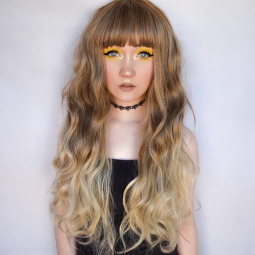 Hazel - Lush Wigs UK Angelic hair is here! Hazel is a delicate ombre. Dark blonde roots melt into a light honey blond ombre, soft loose curls that fall to the waist.