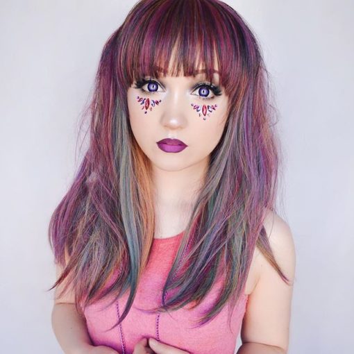Our dark side of the rainbow twist! A mixture of purples, pinks and green tones, blended with a deep red to bring it to life. Vivid colours transformed into muted tones.