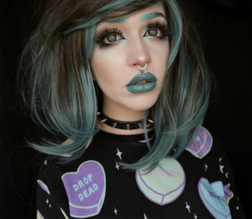 Blue and brown long bob wig. Debaser is a grungy lob, the brunette tone has 90s style slices of blue/green that frame the face.