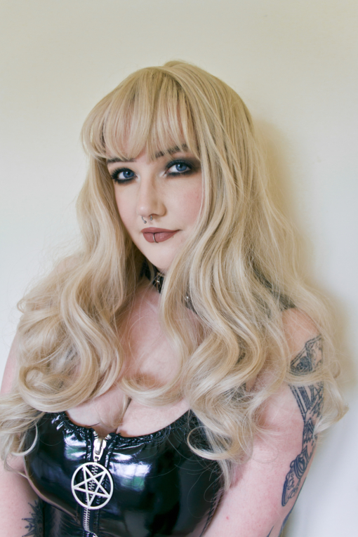 Callisto is a sandy blonde earthy colour from roots to tips. Styled in delicate dropped waves that fall to the waist. Complete with a fringe to frame the face. make it your own with dressing and styling.