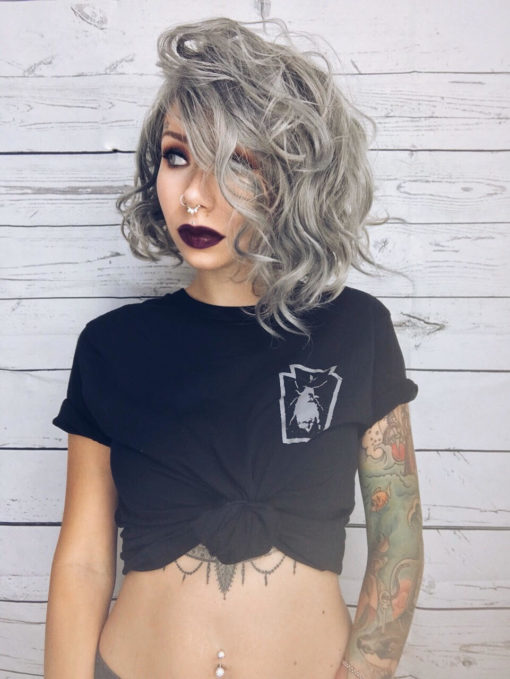 Grey curly bob wig with bangs. We are getting rock chic vibes with Moon Rock! This grungy mix of grey shades with tousled curls. It’s a little messy, subtle and just the right amount of edgy.
