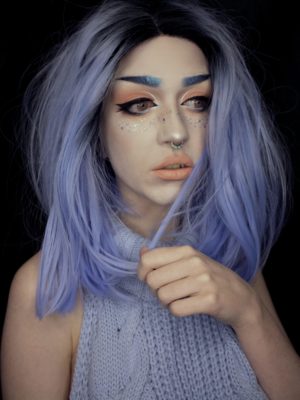 Liberty - Lush Wigs UK Cute baby blue Lace front bob. Shoulder length at the back cut into a wedge that is slightly longer at the front, the style gives this wig plenty of shape and movement. The powder blue colour is both glam and grunge enough to be worn dressed up or styled with an everyday look.