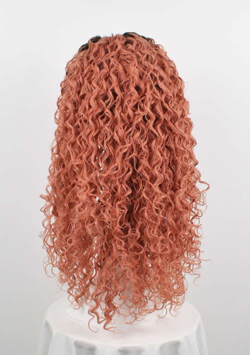 Peach big curly lace front wig. Spiral curls? check. pastel peach? check. = Persica, overflowing with big and bold spiral curls. Brown shadowed roots for a natural feel and Pastel peach locks.