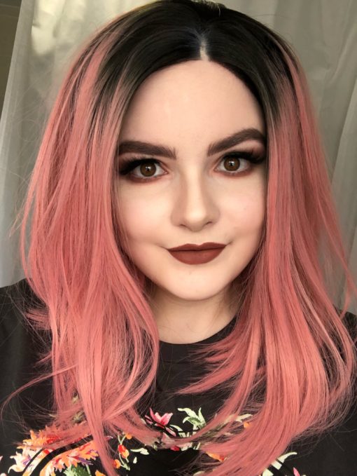 Pink straight long bob lace front wig. Who says pink has to be sweet. Go rock and roll chic in Cosmopolitan. This is a graduated long bob, with black shadowed roots that melt into a lush deep rose. 