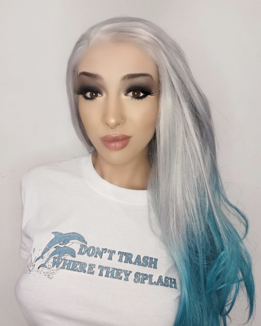 Deja blue is a lace front for a realistic hairline. An ash grey from the roots that blends into a teal blue ombre. sleek and long falling past the waist.