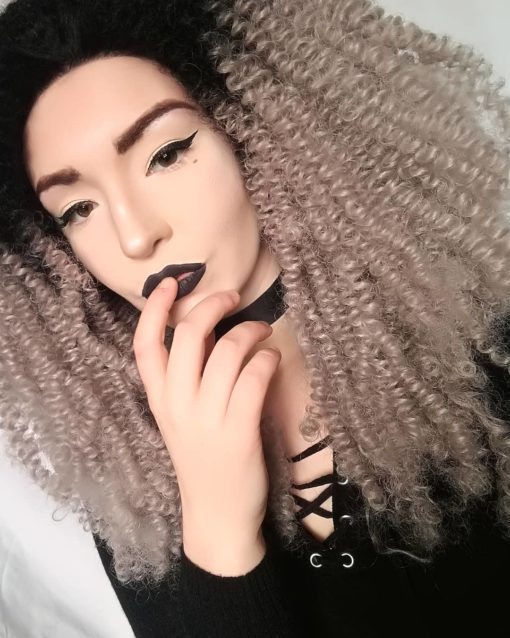 Viva is a tight spiral perm in a black to grey/silver ombre. Bound to turn heads, the curls in this style mean it has HUGE volume and can be teased as high as you can imagine!