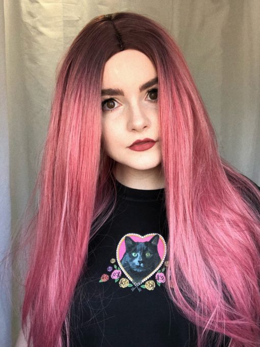 Pink straight long wig. Rhubarb is a sure winner when it comes to pink hair results! The contrast of sweet tones with its deep purple roots that melt into a rich rose pink colour have us in awe.