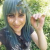 Green long straight wig with fringe. Forest defines deep green hair! Subtle layers give this sleek look some movement.
