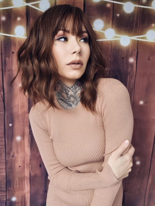 Chai is a natural and simple bob style that comes in a light brown colour with sun kissed highlights. Styled in loose beachy waves for texture.