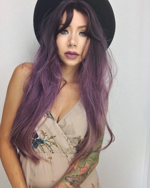 Purple long straight wig with bangs. Calling all who adore purples, violets and all the amethyst dyes. Love Potion will have you under its spell! Dark brown shadowed roots with a purple that melts into a washed out violet.