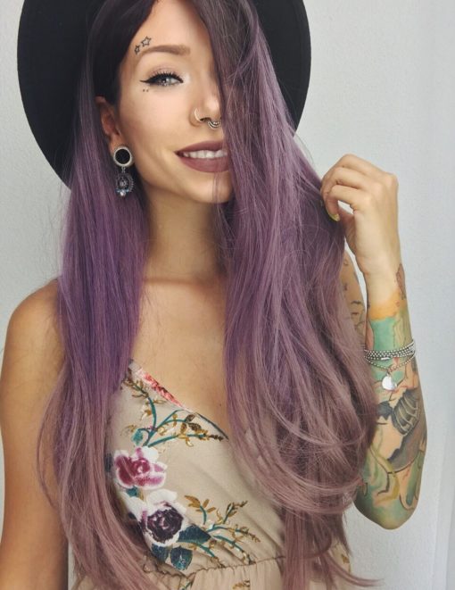 Calling all those who adore the amethyst hues. Love Potion will have you under its spell! A long thick curtain fringe adds layers. Dark brown shadowed roots melt into purple hues, with dip dyed violet ends.
