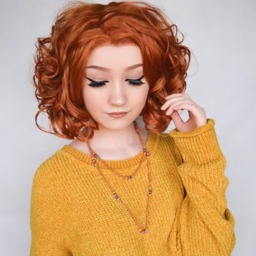 Gorgeous multi-tonal auburn wig, this cute curly bob has plenty of depth and movement. This style is capless with a lace front, which keeps it cool and breathable, and easy to maintain. The curls can be brushed out and teased for volume, or kept sleek and tamed.