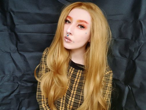 Pure gold! Harvest is a gorgeous, unusual golden wig, the richest colour which falls in long, sleek layers with a slight wave for movement. Ultimate glamour lace front!