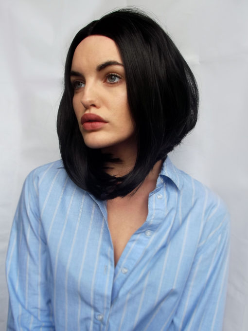 Little black bob! Raven is a sleek, chic middle parted bob which is finished in a graduated style. It has a blow-out effect giving the smooth lengths plenty of volume. This is a stylish and natural black bob for the ultimate glamour.