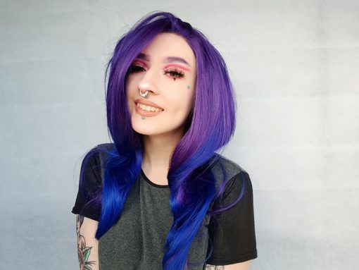 Purple and blue ombre lace front wig. Wonder is a Layered hairstyle that gives the illusion of length and volume. Dark purple from the roots and to the mid-length, then melts into a dip dye indigo blue dip-dye. Sleek and straight.