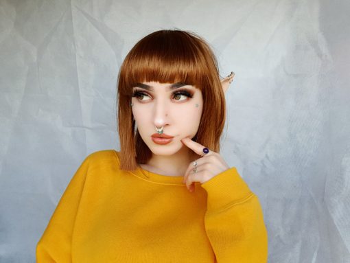 Blunt bob Copper has a full, blunt fringe and is a lovely golden brown colour. This style is cut in a very straight jaw-length bob, a classic style that never goes out of fashion!