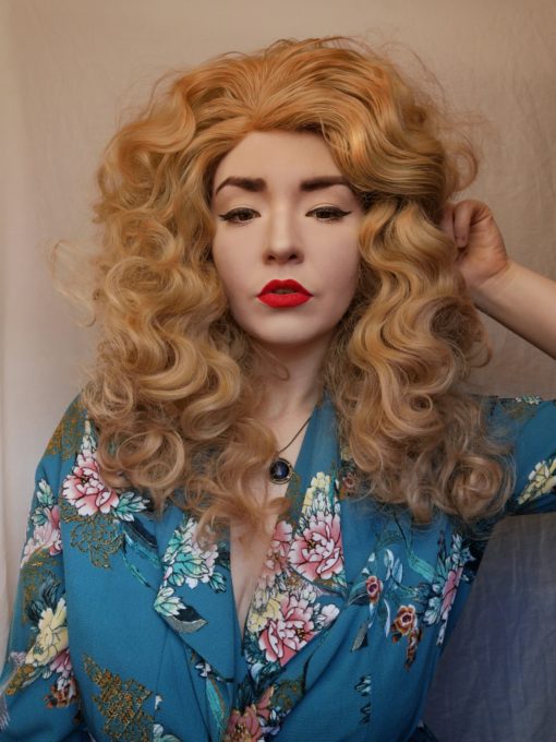 Big blonde curly lace front wig. Lexie delivers seriously big hair, with barrel curls in a honey blonde colour.