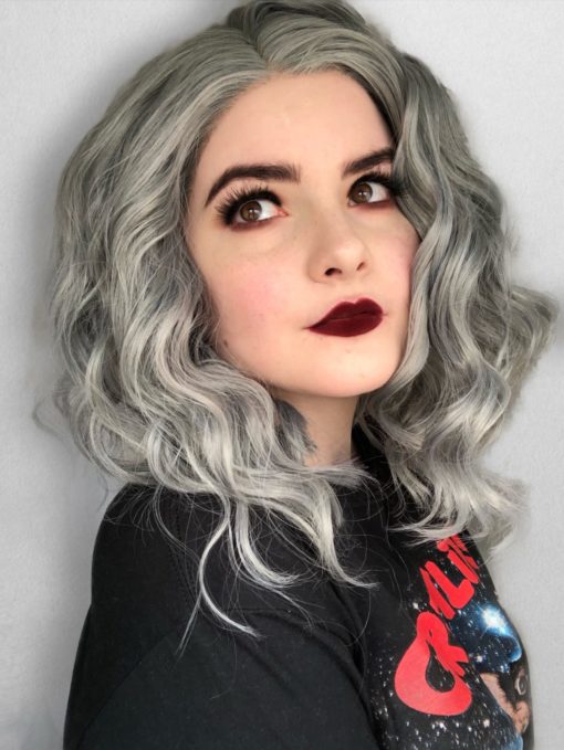 Grey mix A-line bob lace front wig. Classic cut? check. Quirky Grey pigments? check. = Luna with a mix of silvery dark grey and blue undertones in loose crimped waves.