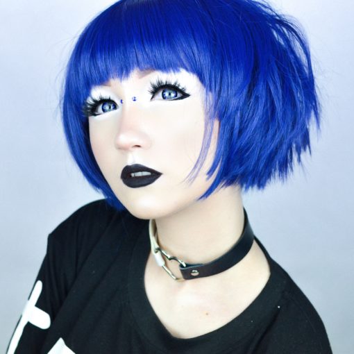 Wow! This tiny bob is super bold! Choppy and very short, this bold blue is a punchy little style that'll make you stand out. A blunt fringe and some short layers frame the face, and the layers in the back look fantastic when tousled.