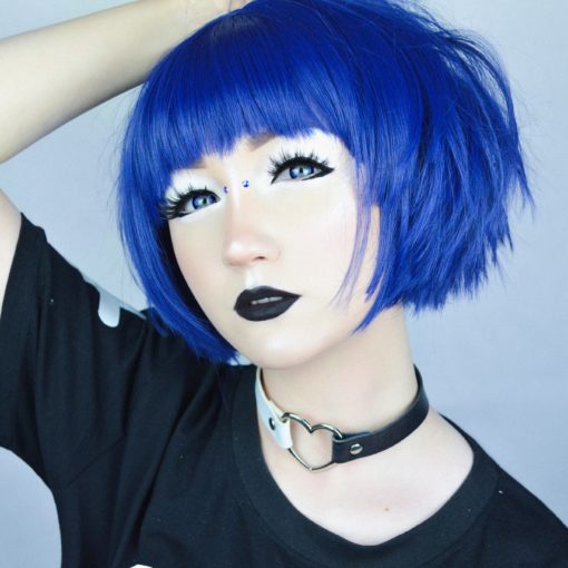 Wow! This tiny bob is super bold! Choppy and very short, this bold blue is a punchy little style that'll make you stand out. A blunt fringe and some short layers frame the face, and the layers in the back look fantastic when tousled.