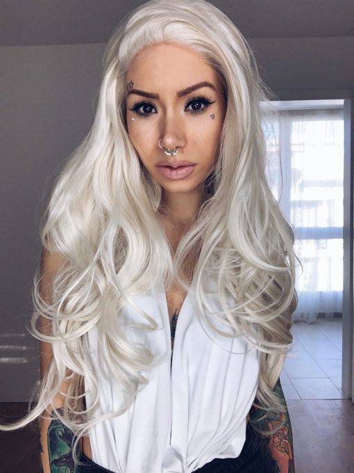 Blonde long curly lace front wig. Summer is simple but never understated. A pearly white blonde colour. With long layers for movement. 