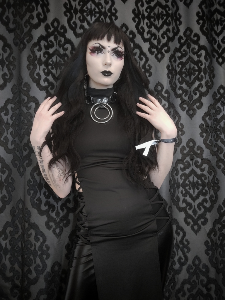 Apparition - Lush Wigs UK A very dark brown colour from roots to tips. Styled in loose waves that fall to the waist. Long invisible layers to add body and movement to the look. With a sleek blunt fringe.