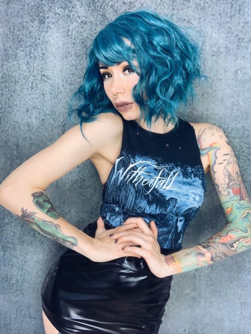 The brightest blue bob! This brilliant, vibrant colour is destined to make you stand out from the crowd. Finished in a short, wavy bob, Tidal is easy to wear and look after. The fringe can be left long and swept over, or trimmed for a blunt style. So cute!