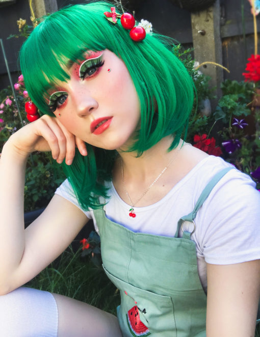 Cute little bright green bob with a long fringe. Wicked is an easy to wear little style that falls about jaw-length. The fringe can be styled swept to one side, or trimmed slightly to be blunt. Perfect for newbies who are looking for a pop of colour!