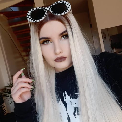 Light blonde long lace front wig. We are obsessed with these ice princess tresses. Layla is a sleek platinum blonde, with brown roots for a natural edge.