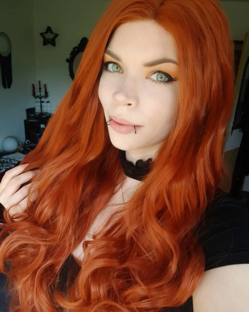 Orange red long curly lace front wig. Chilli is a bold concoction of colour with orange and red hues, with a pinch of ginger. Loose barrel waves bring this style to life.