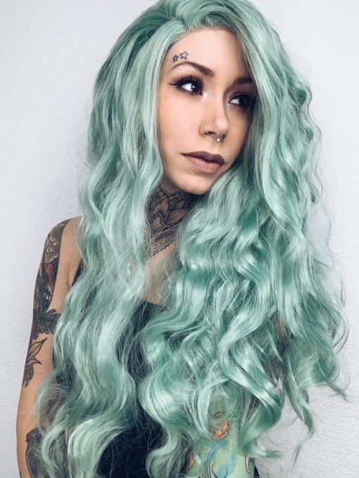 Pastel green long wavy lace front wig. Beachy waves? Check. Topical colour? Check. = perfect mermaid hair! Aileana has pastel green crimped waves.