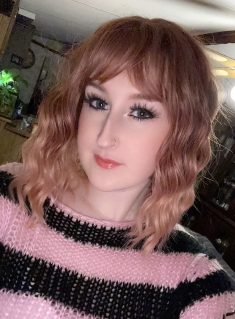 Mara - Lush Wigs UK This bob is a mix of coral and light blonde tones that deliver a beautiful natural ginger hue. With a creamy peach dip dye effect on the ends. The style carries a defined wave that falls just above the shoulders, with a sleek blunt fringe.