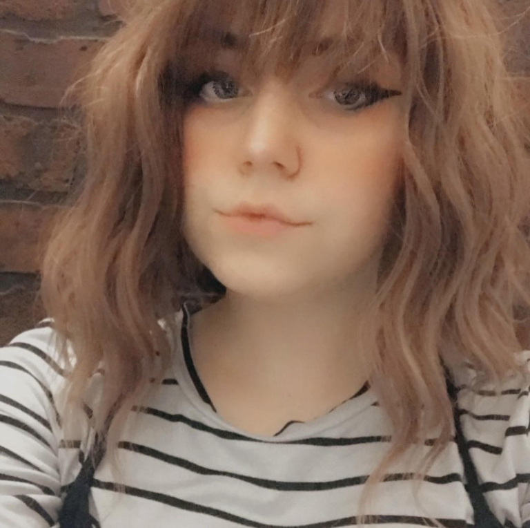 We should let the reviews speak for this one! This natural twist of brown shadowed roots that melt into a muted pink and plum mix ombre. A loose wave bob with a sleek fringe.