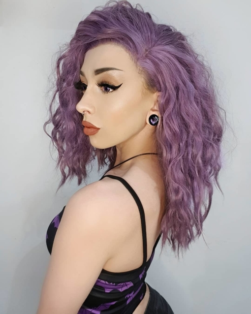 Purple wavy long bob lace front wig. Full of thick crimped waves, that looks like the result of braids let loose. We love this dusky lilac colour.