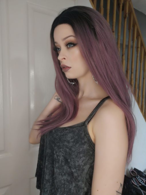 Purple long straight lace front wig. Maze is pretty and alluring, with brown overgrown roots that give a natural edge, blending into a mauve colour on these sleek locks.